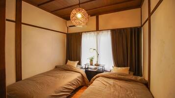 2 室のベッドルーム、WiFi (無料)、ベッドシーツ