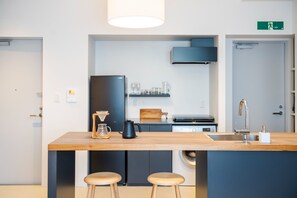 Fridge, microwave, stovetop, cookware/dishes/utensils