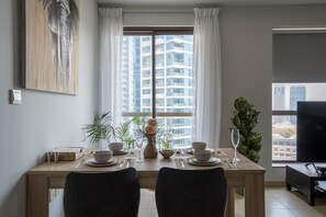 Design Apartment, 1 Bedroom | Living area | Flat-screen TV