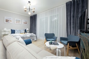 Studio, Balkon, am Strand | Wohnbereich