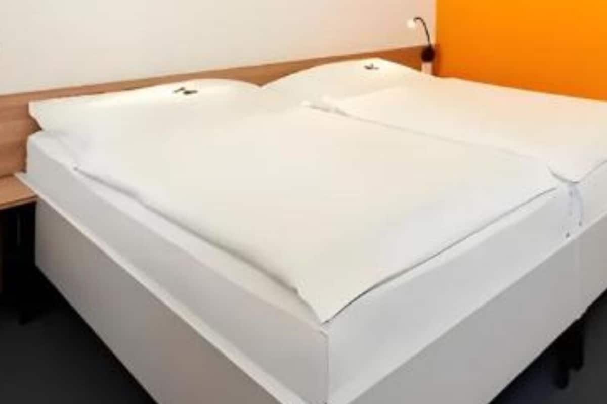 Laptop workspace, blackout curtains, soundproofing, free WiFi