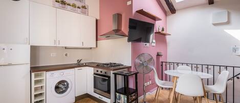 Fridge, oven, electric kettle, cookware/dishes/utensils