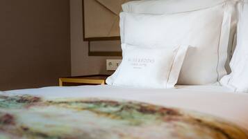 Suite Prestige | Literie hypoallergénique, lit avec matelas en mousse à mémoire, minibar