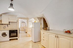 Apartment | Private kitchen | Full-size fridge, oven, stovetop, cookware/dishes/utensils - La Chicca Historic Center Beautiful Flat (Monopoli)