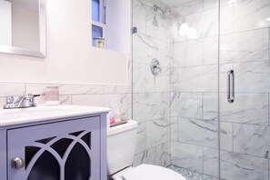 Bathtub, hair dryer, towels
