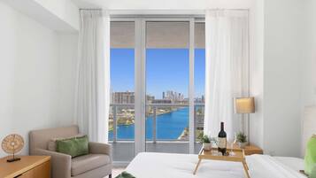 1 bedroom, desk, iron/ironing board, travel crib