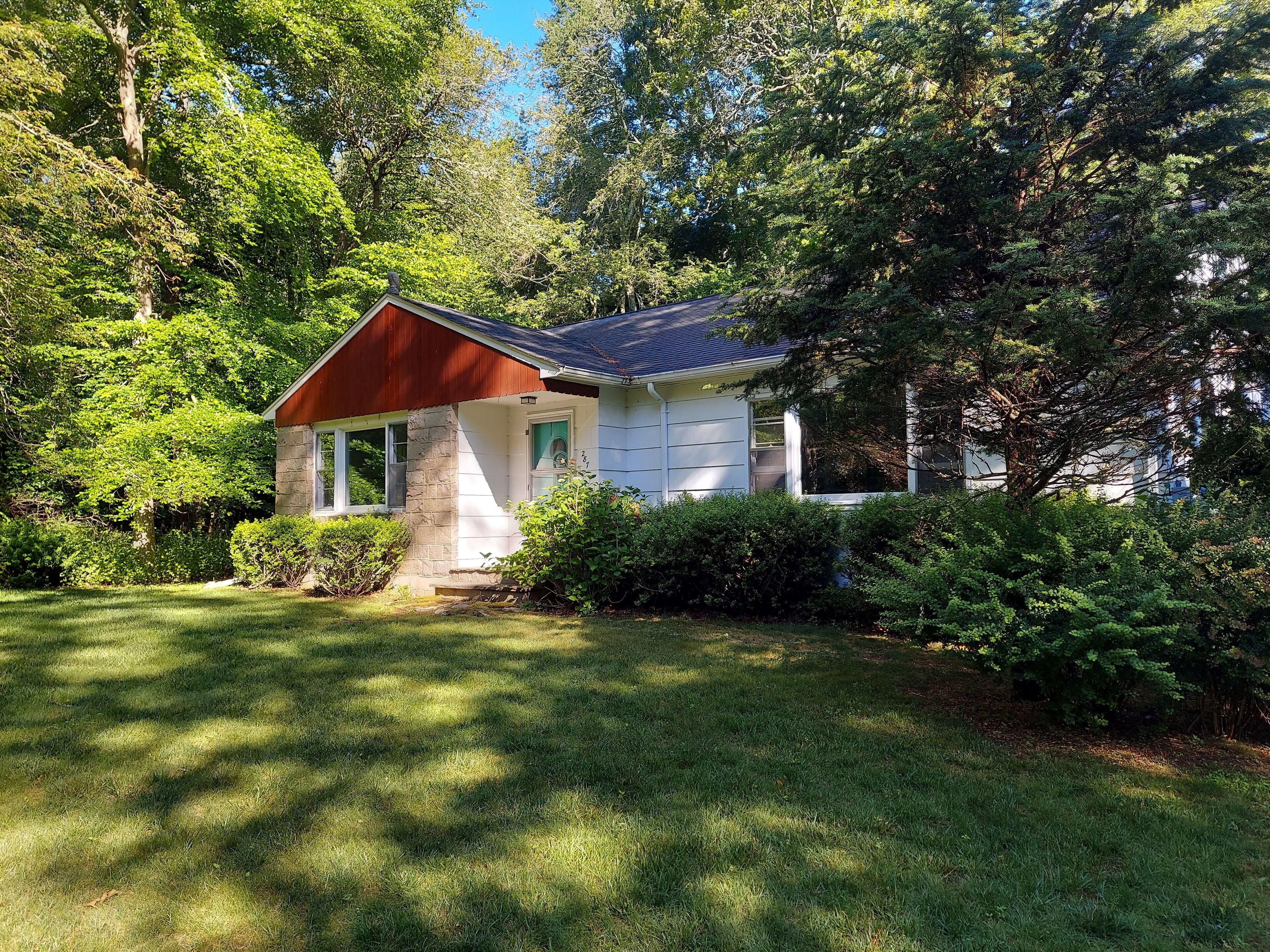Now renting!  Beautiful wooded retreat house with nearby beach access