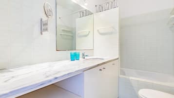 Basic Apartment, 2 Bedrooms | Bathroom | Combined shower/bathtub, free toiletries, hair dryer, bidet