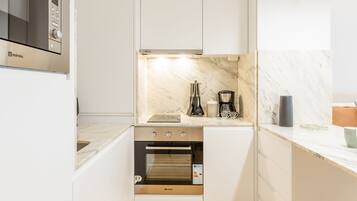 Departamento, 1 habitación | Cocina privada | Refrigerador, microondas, horno y parrilla de estufa