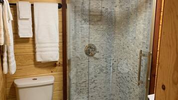 Shower, towels, toilet paper