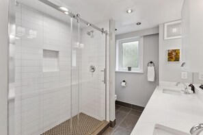 Bathtub, hair dryer, towels, soap