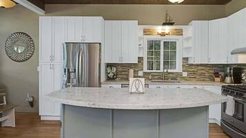 Espresso maker, coffee/tea maker, fridge, microwave