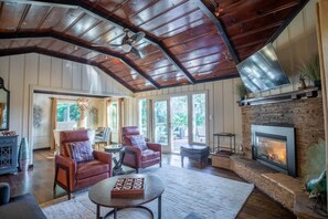 Smart TV, fireplace, books