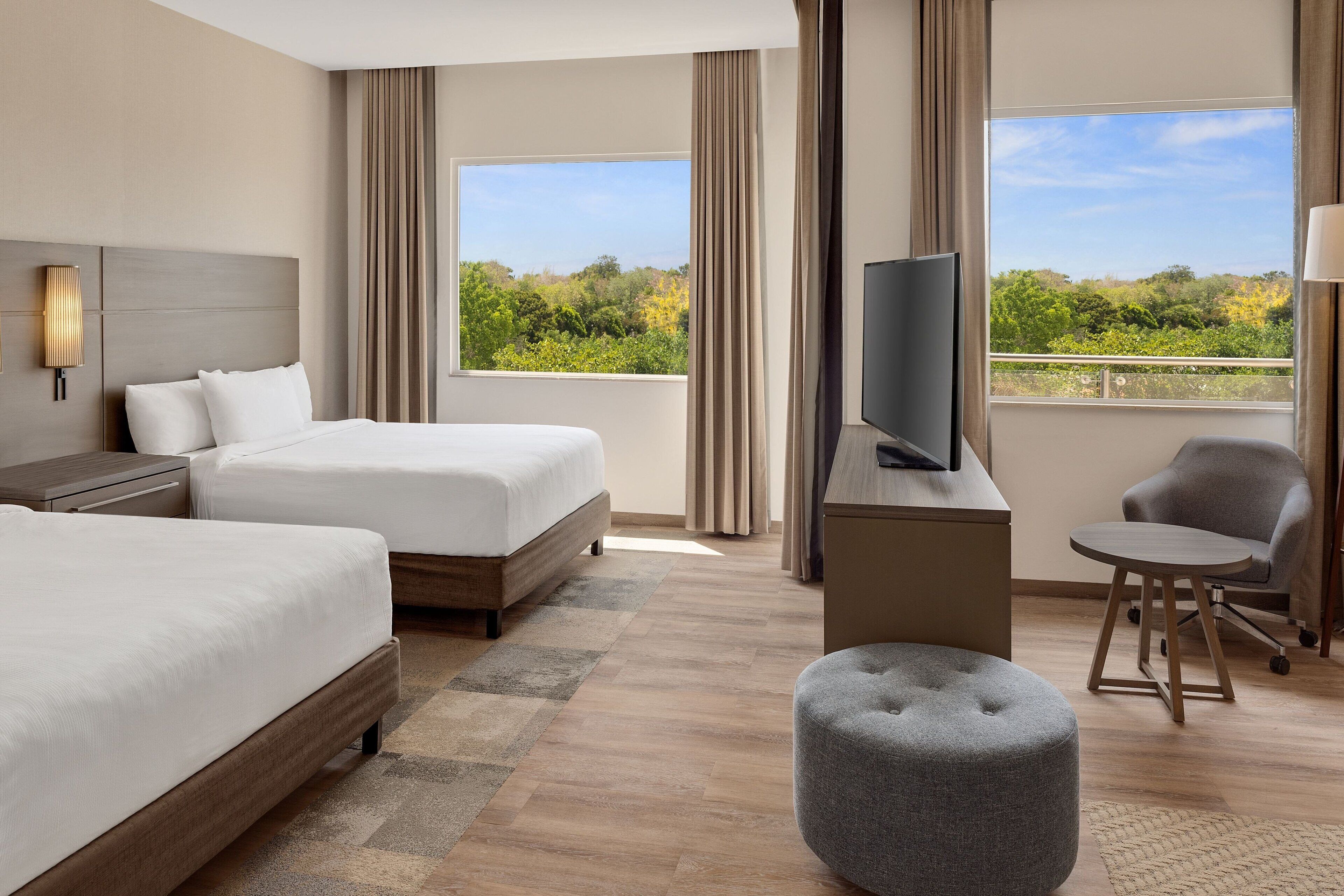 Studio, 2 Queen Beds, Garden View (Balcony) | In-room safe, laptop workspace, blackout curtains, soundproofing