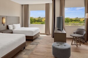 Studio, 2 Queen Beds, Garden View (Balcony) | In-room safe, laptop workspace, blackout drapes, soundproofing