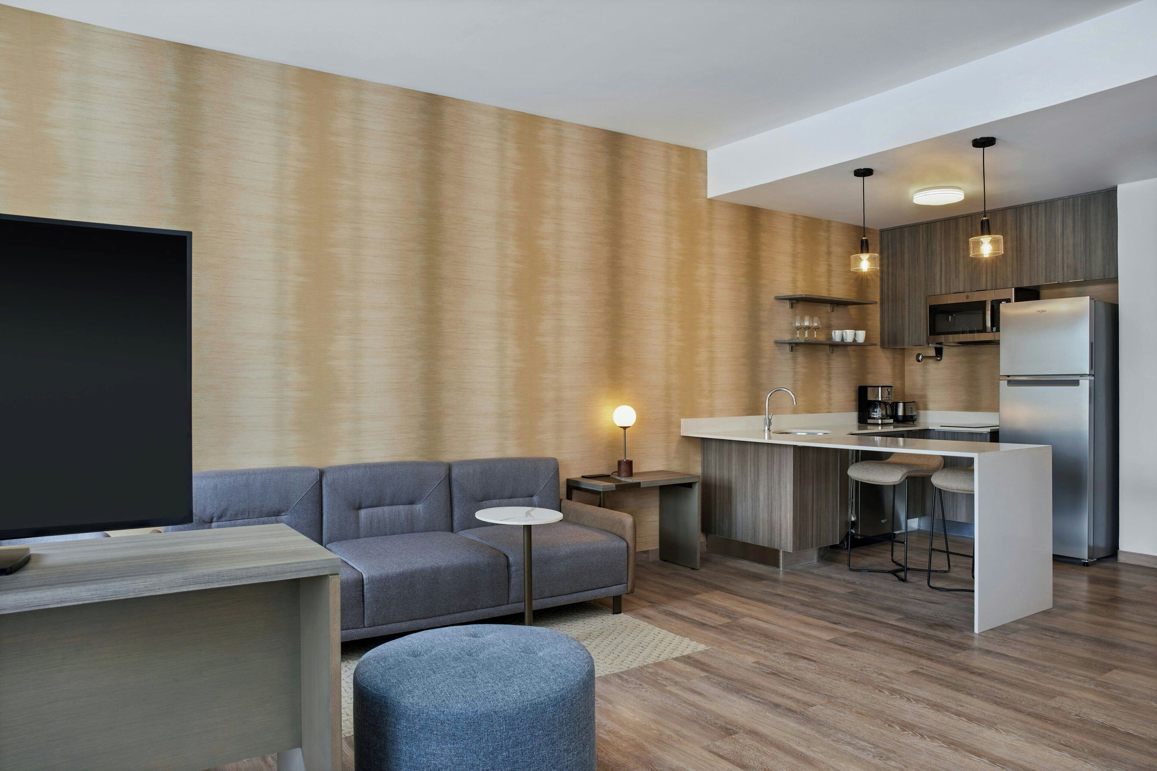 full-sized fridge, microwave, stovetop, dishwasher