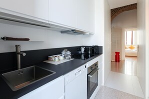 Comfort Apartment, 2 Bedrooms, City View (Via Pioppette 3) | Private kitchen | Full-size fridge, microwave, stovetop, dishwasher - Heart Milan Apartments - Duomo Colonne (Milan)