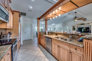 Fridge, microwave, oven, stovetop - Cape Coral waterfront home!  Huge heated saltwater pool, BBQ, and fire pit! (Cape Coral)