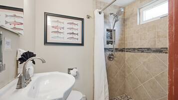 Shower, hair dryer, towels, soap