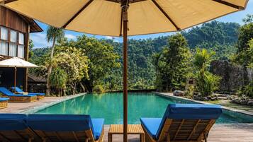 Outdoor pool, pool umbrellas, pool loungers