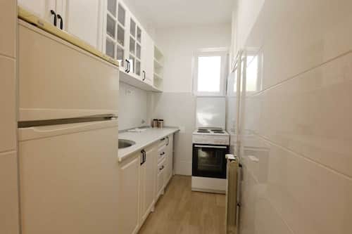 Family Apartment | Private kitchen | Full-sized fridge, oven, stovetop, espresso maker