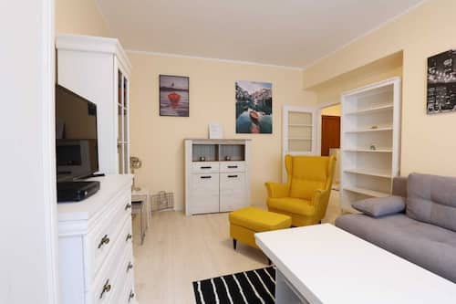 Family Apartment | Living area | 40-inch flat-screen TV with cable channels, TV