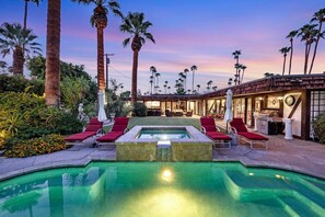 A heated pool, pool loungers