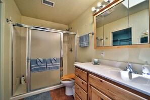 Combined shower/bathtub, hair dryer, towels, soap