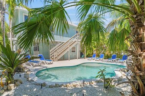 Outdoor pool, a heated pool - Charming cottage with heated pool, tropical landscaping in prime location. (Anna Maria)