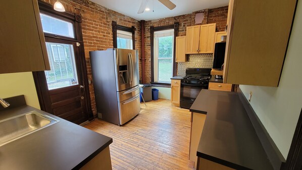 Fridge, microwave, oven, stovetop - Historic 155 y/o 3-bedroom KC house with hot tub. (Kansas City)