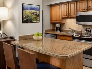 Fridge, microwave, stovetop, coffee/tea maker