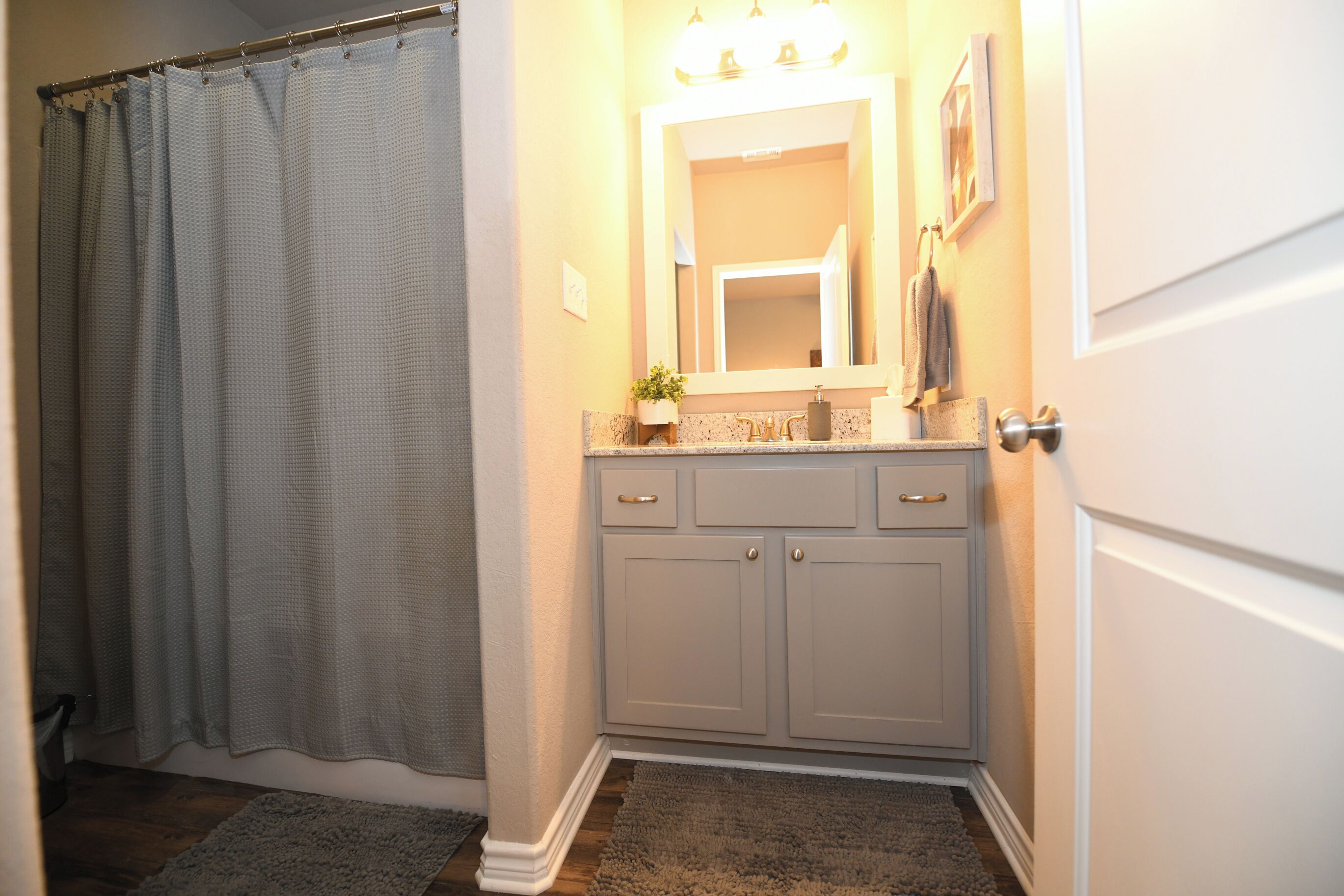 Combined shower/tub, hair dryer, towels, soap