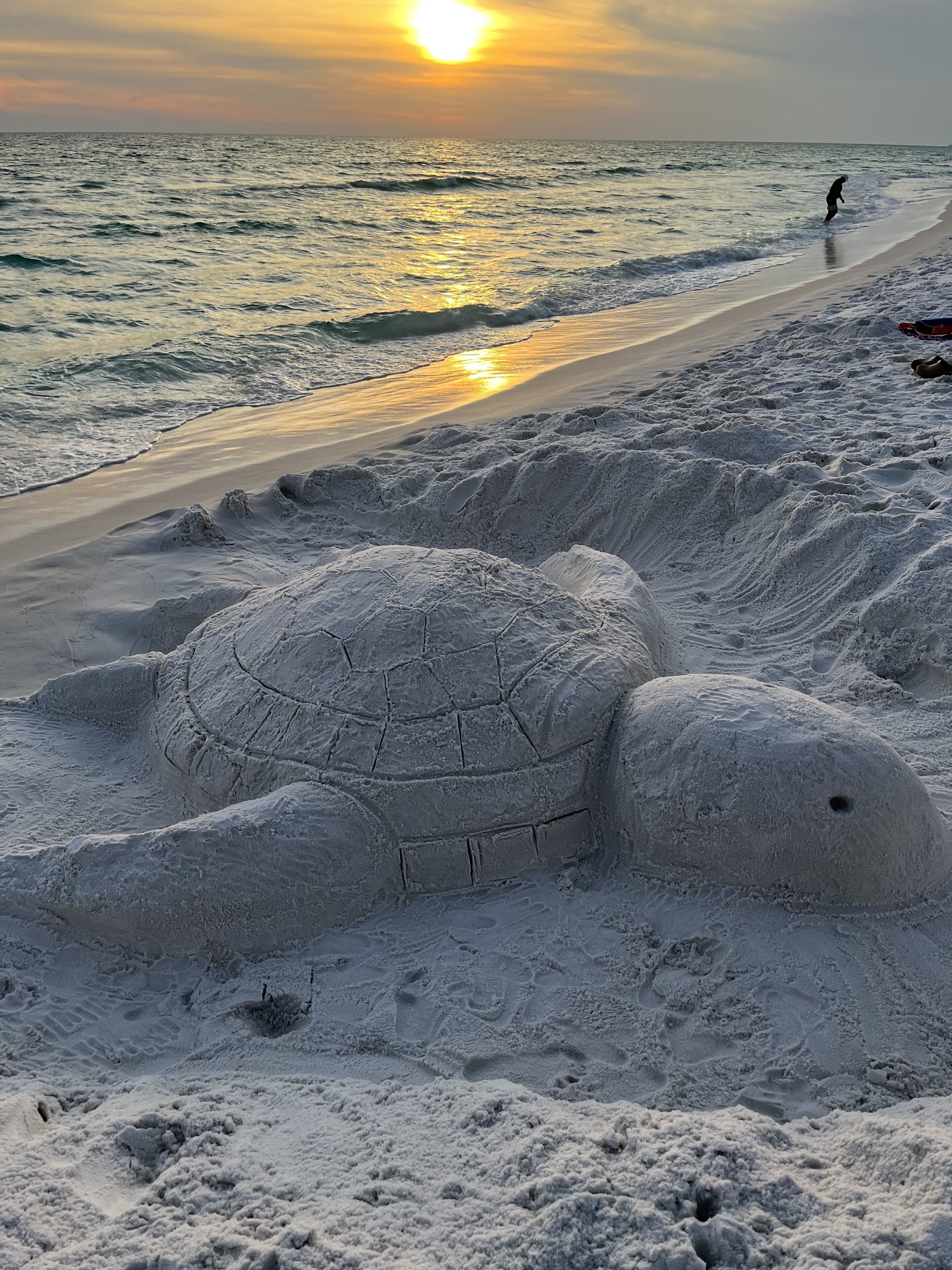 On the beach, sun-loungers