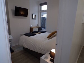 Apartamento | 2 quartos, ferros/tábuas de passar roupa, Wi-Fi de cortesia