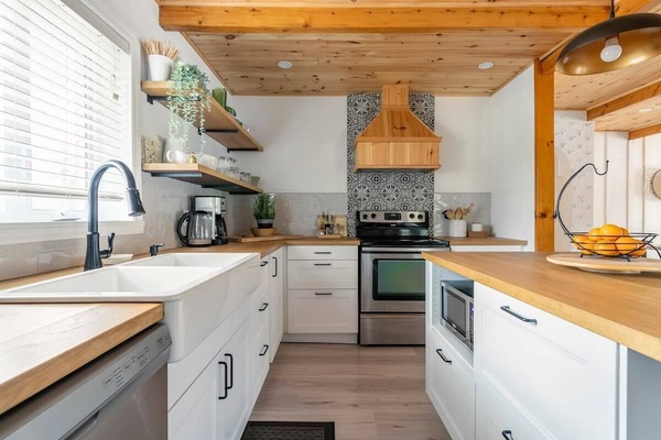 Kitchen with everything you need, dishwasher, microwave, and more.