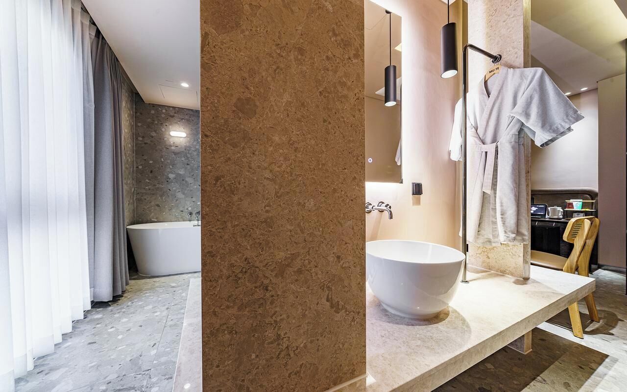 Special Offer - Deluxe Double | Bathroom | Hair dryer, bathrobes, towels, soap