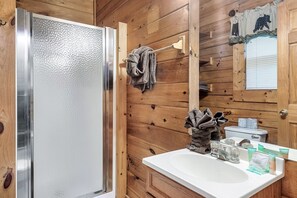 Combined shower/tub, hair dryer, towels, soap