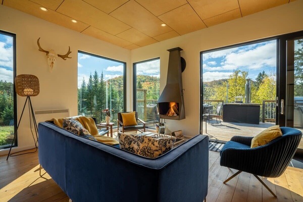 Relax by the warmth and enjoy the snow outside.