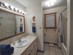 Shower, towels, soap, shampoo