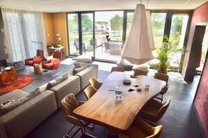 Dining - A great, huge house on the water with 9 bedrooms. (Joure)