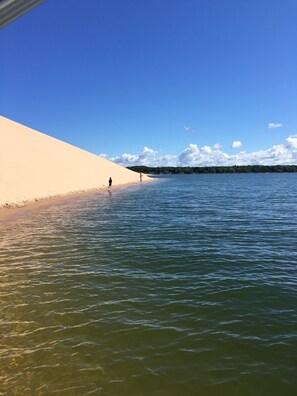 On the beach, sun loungers