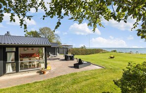 Outdoor dining - Cozy home in Bjert with house sea view (Bjert)