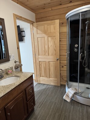 Shower, jetted tub, hair dryer, towels