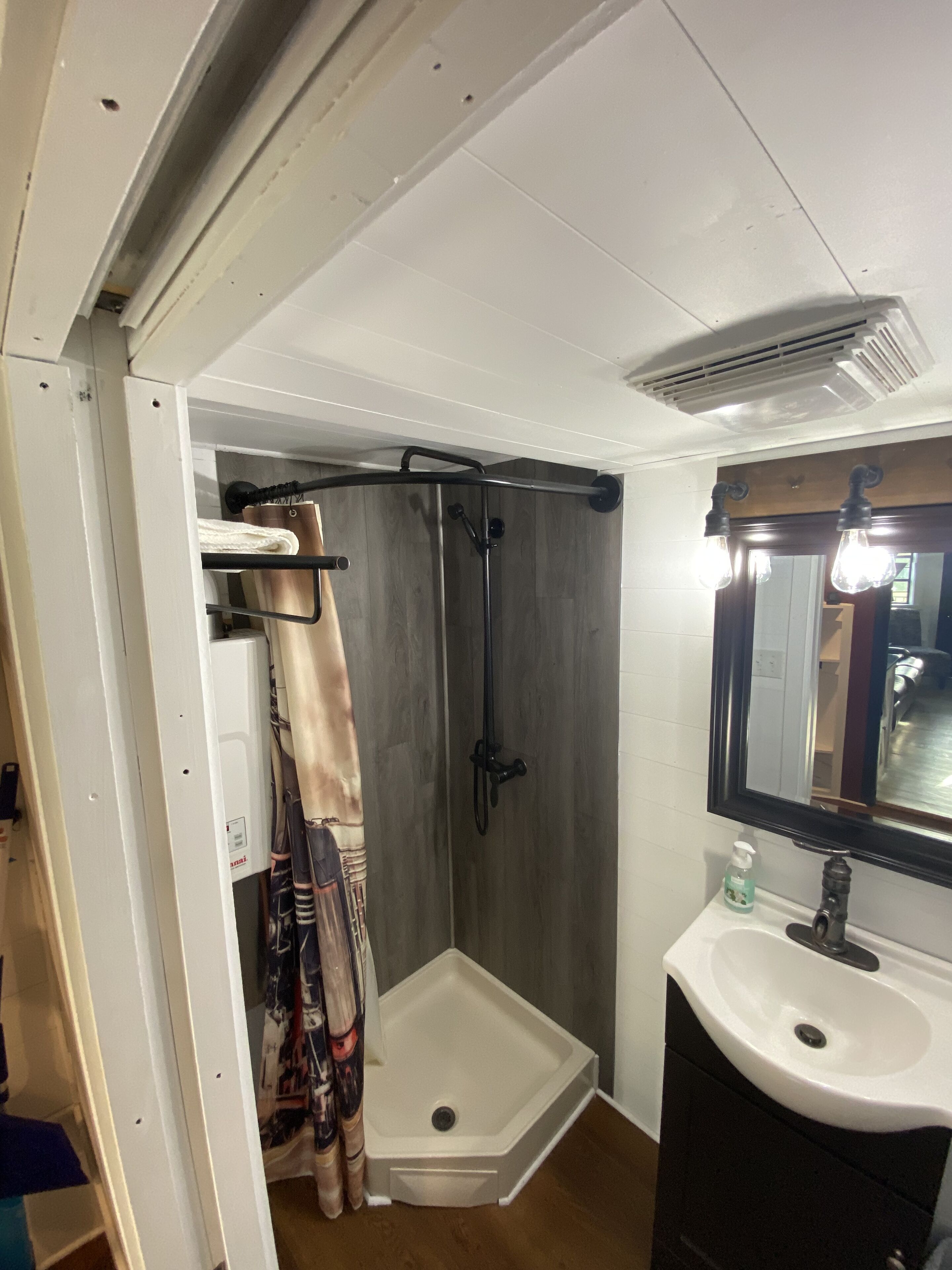 Shower, towels, toilet paper