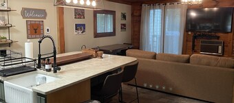 Get cozy for the winter in this 3 floor, 4 bedroom rustic ski home