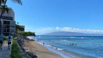 On the beach, sun loungers, beach towels