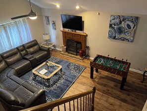 Smart TV, fireplace, table football, ping pong