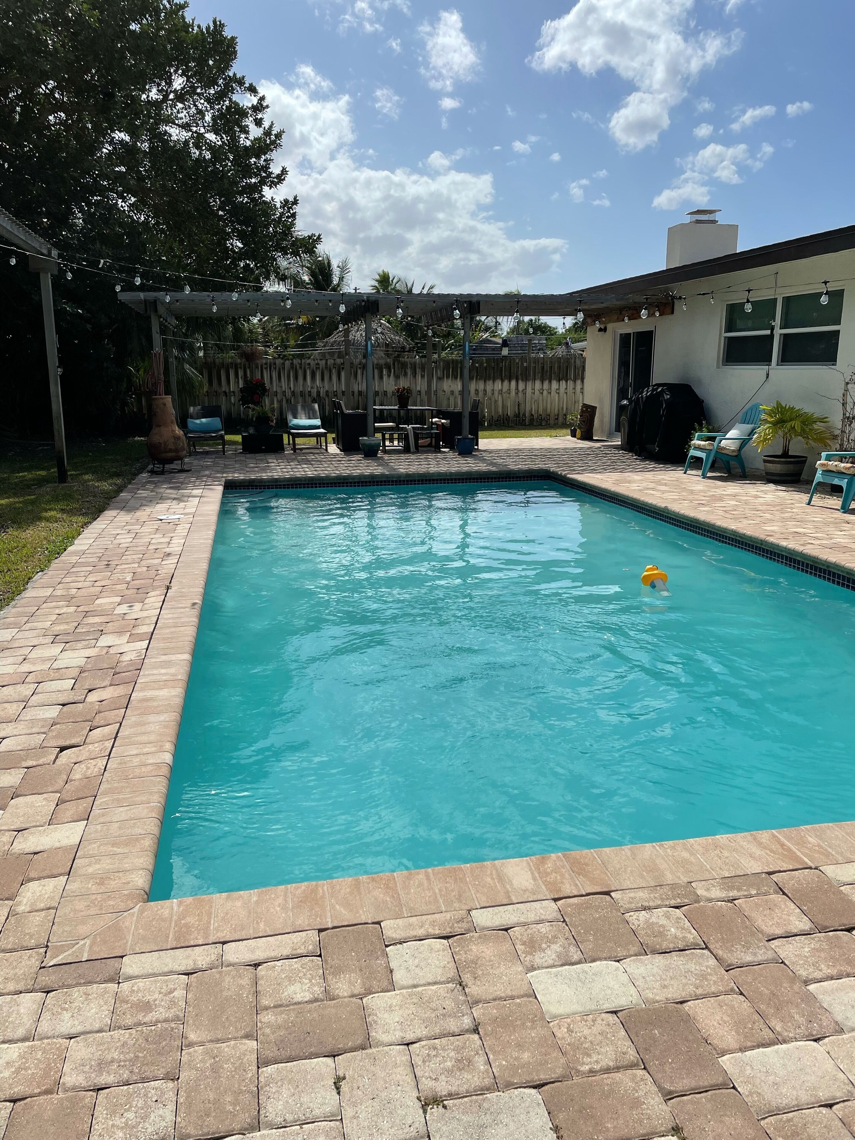 Beach house with HEATED pool one block from the beach!