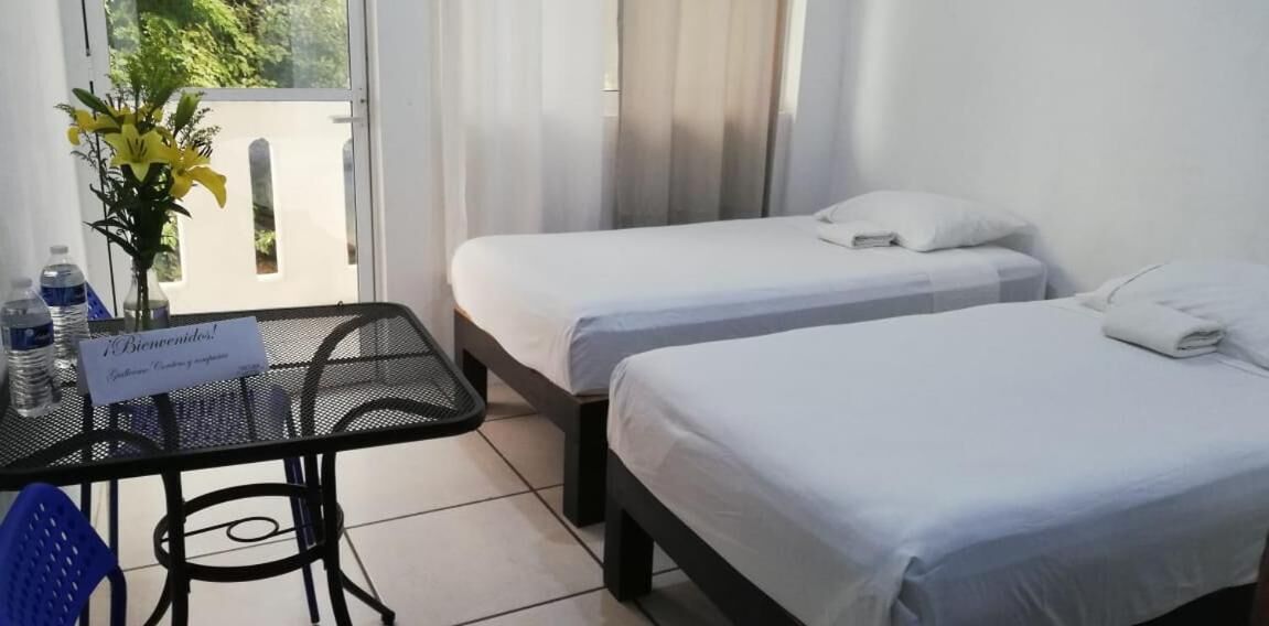 Photo - Standard room with two single beds for relaxed stay