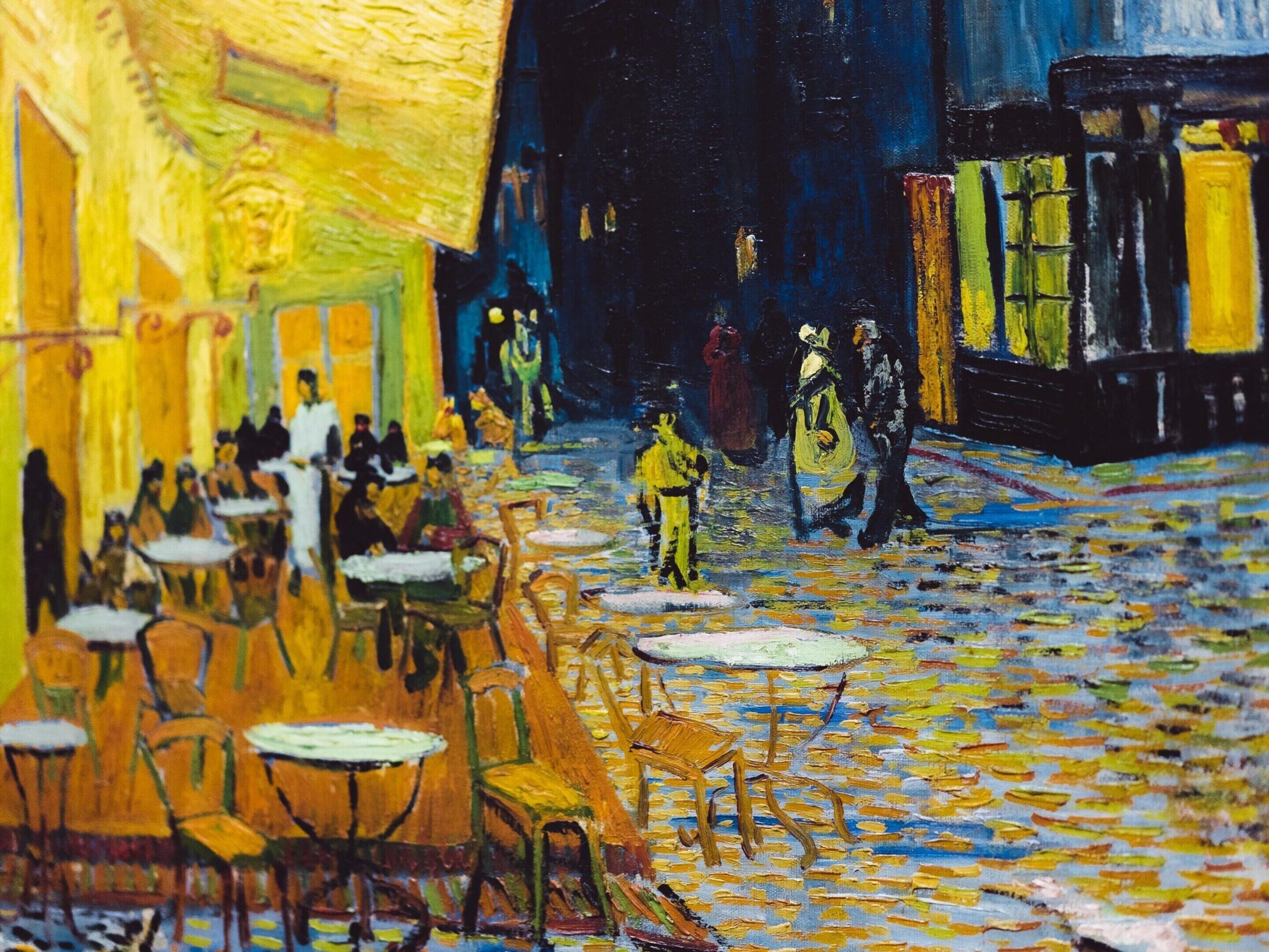 A café with outdoor seating and tables.